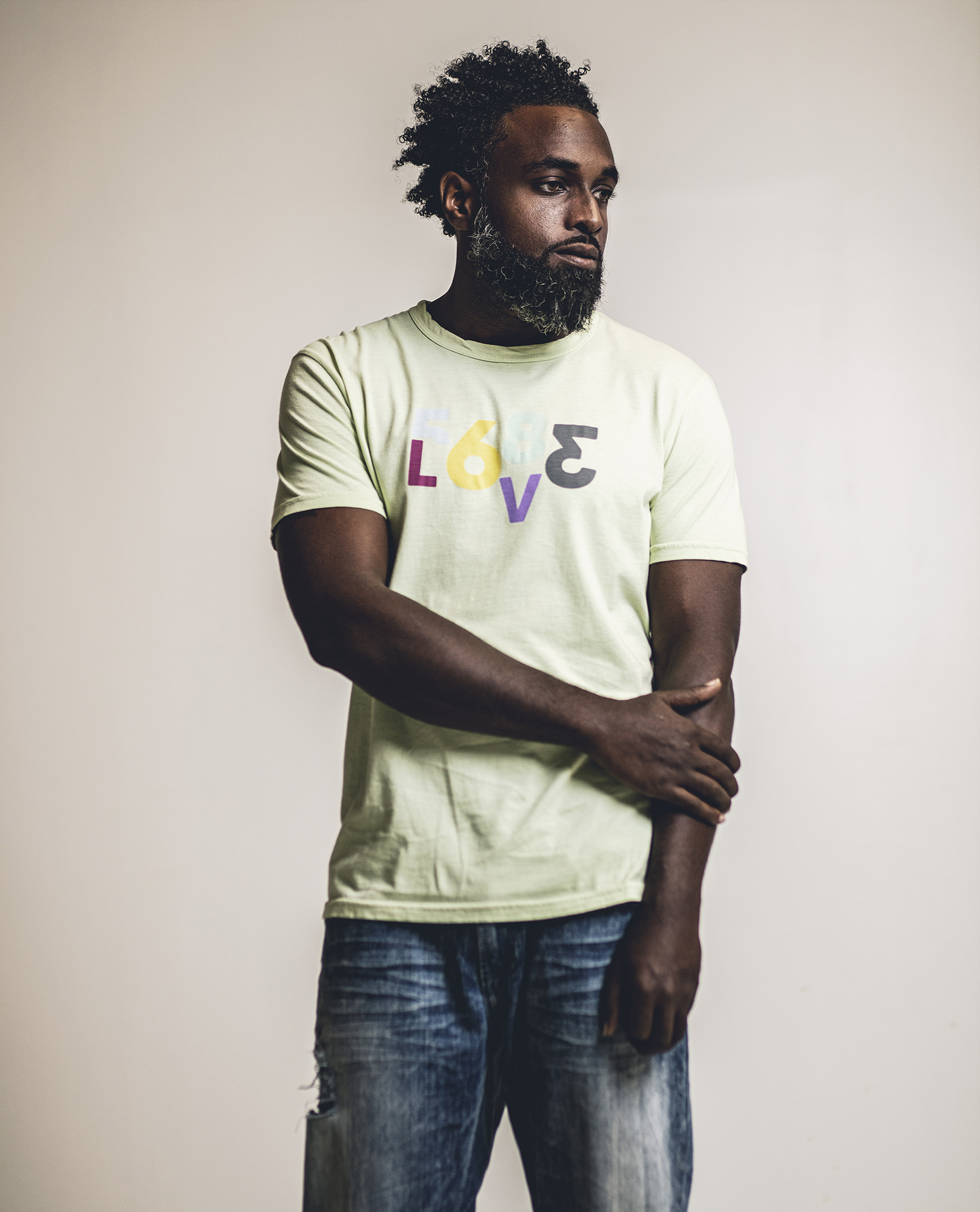 “Puzzle Love” Unisex Tee - Graphic on Pima Cotton, Garment Dyed Crew Neck Tee